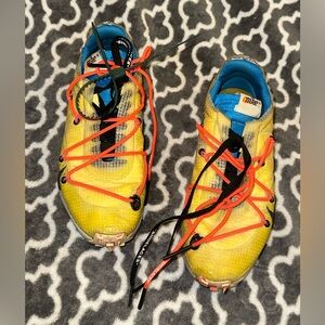 Nike Off Whites Yellow, Carolina Blue Sneakers with Orange and Black strings.